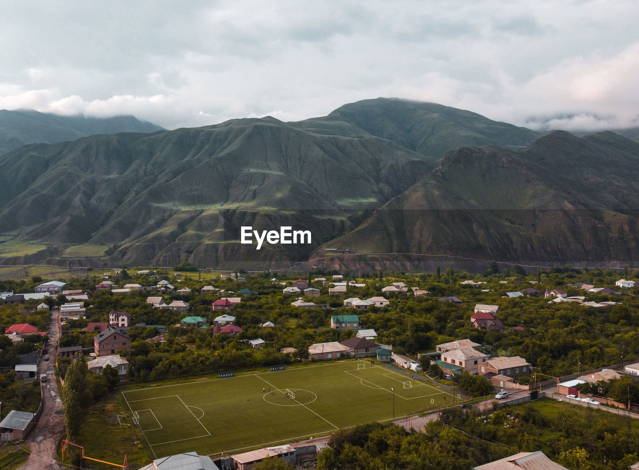 Akhty, football against the background of the mountains