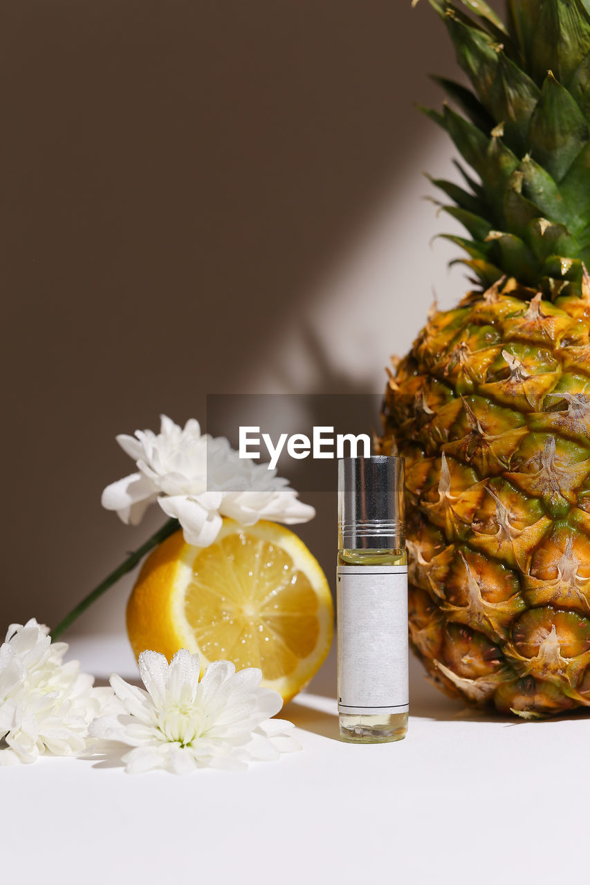 close-up of pineapple in glass on table