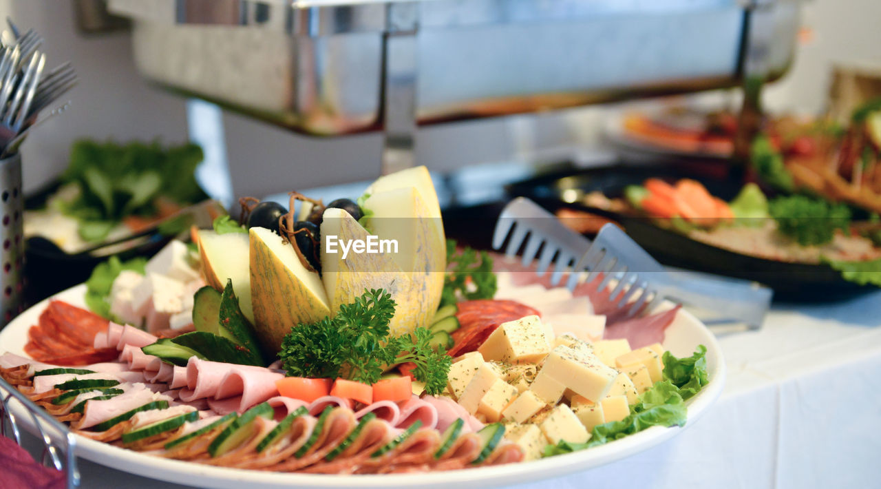 CLOSE-UP OF MEAL SERVED ON TABLE