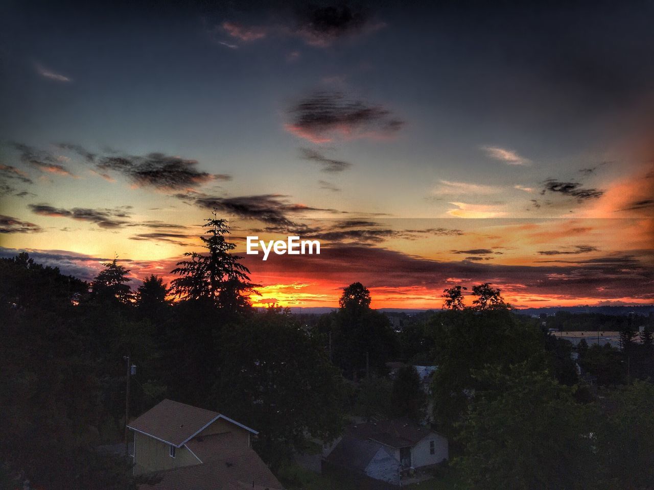 VIEW OF CLOUDY SKY AT SUNSET