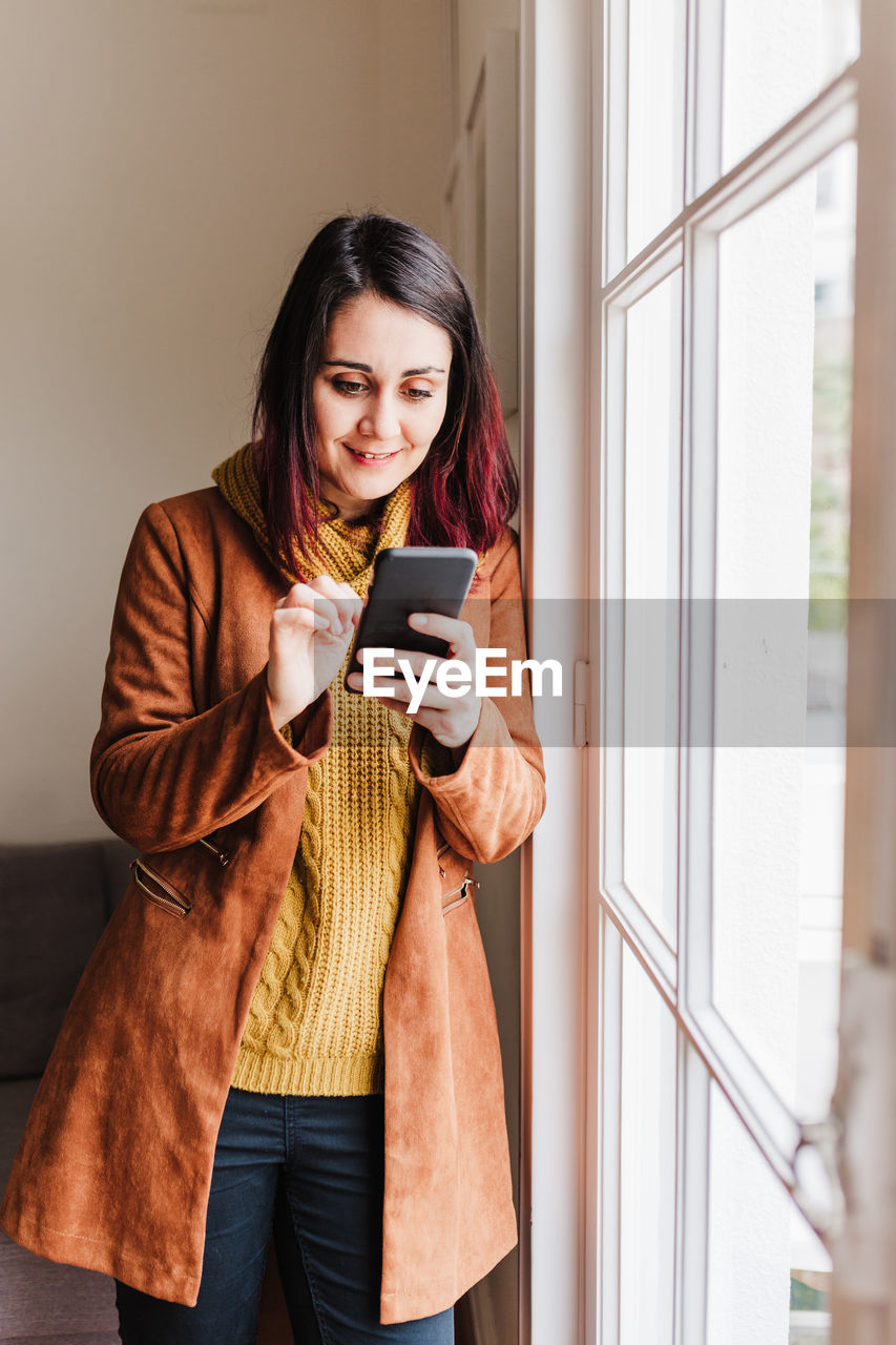 Young woman using mobile phone