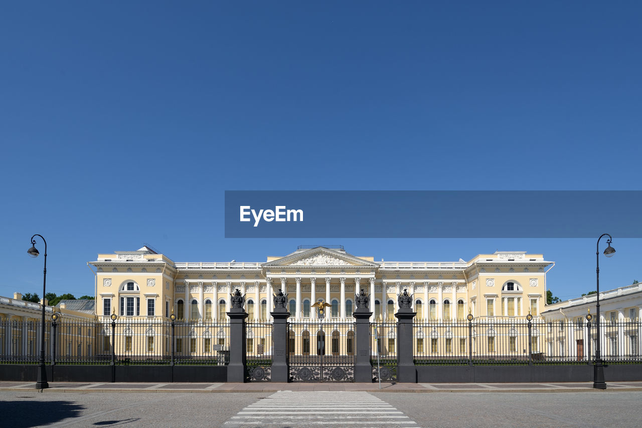 Facade of building against blue sky