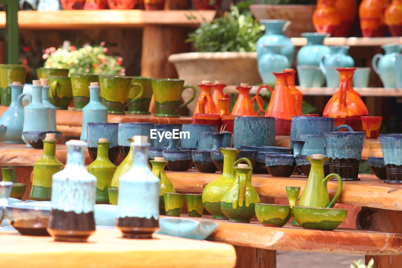 Close-up of ceramics for sale at market stall