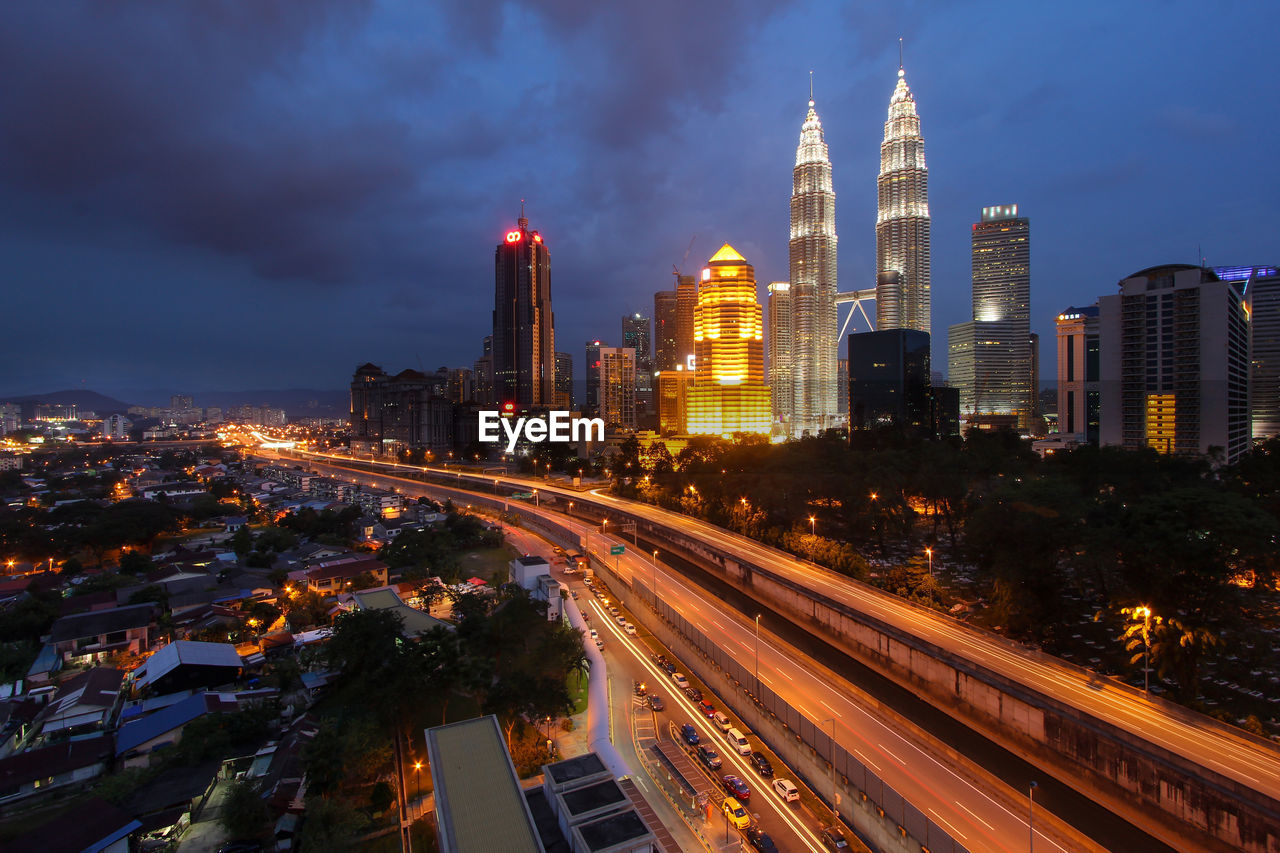 High angle view of illuminated cityscape at night