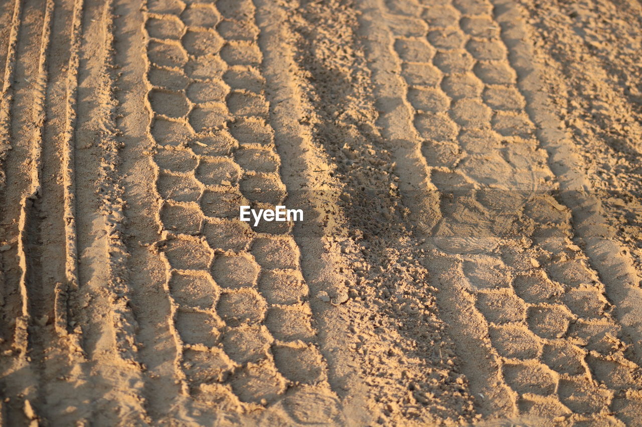 FULL FRAME SHOT OF TIRE TRACK