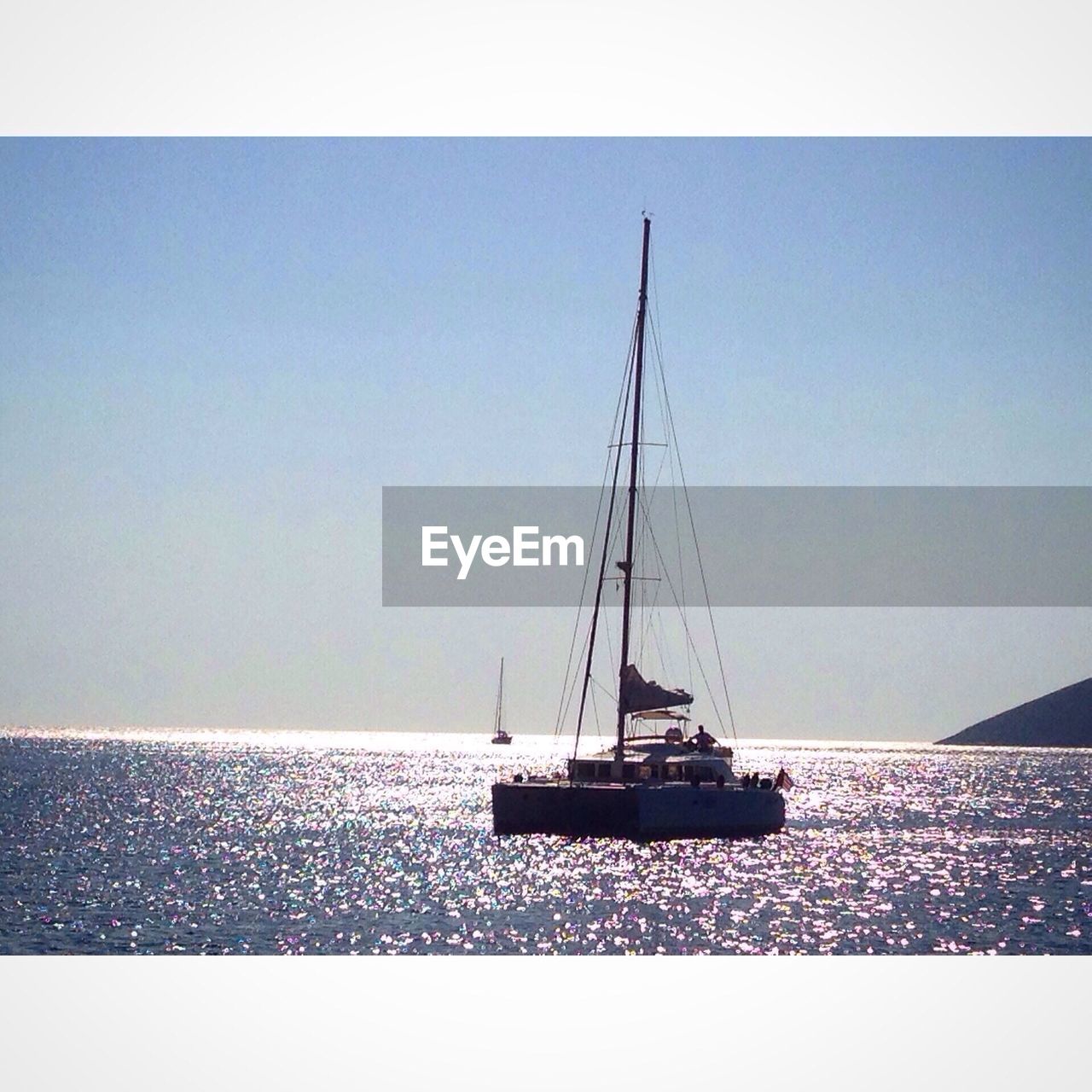 Nautical vessel on sea against sky