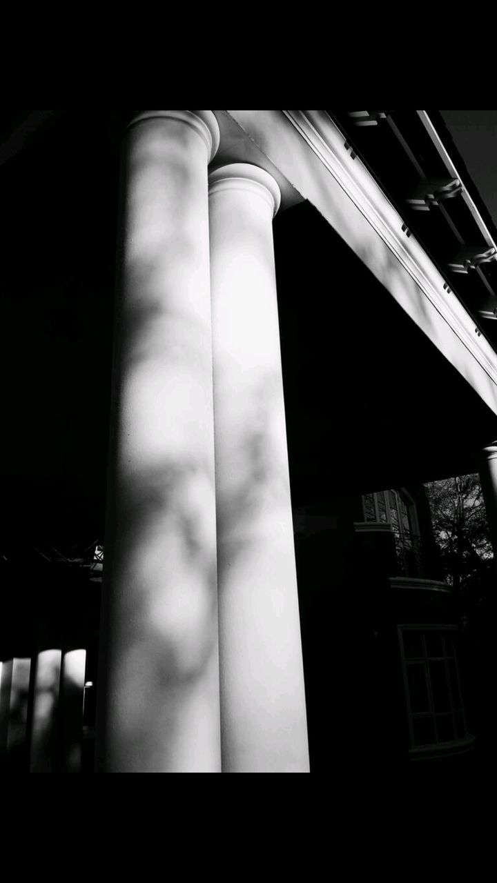 LOW ANGLE VIEW OF SMOKE STACKS