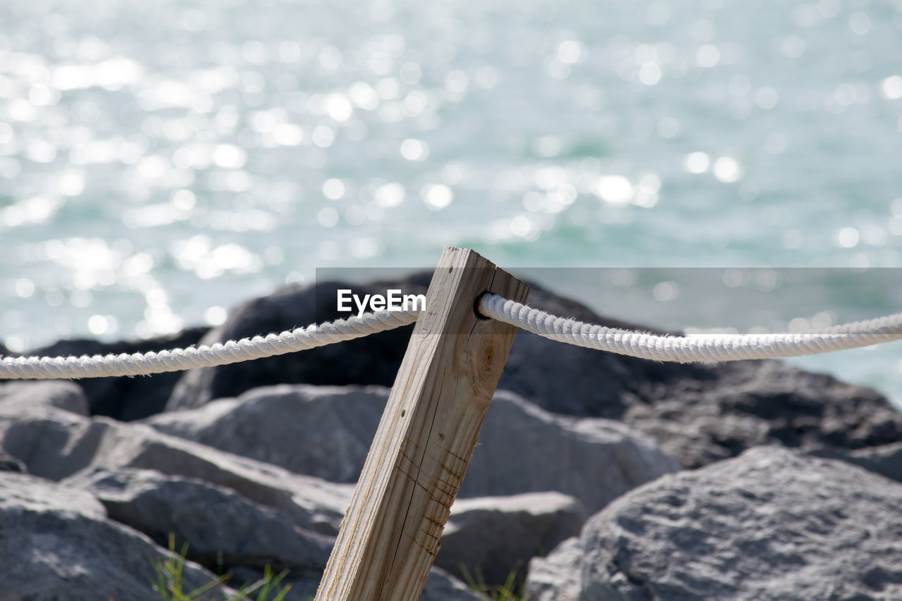 Close-up of rope against sea