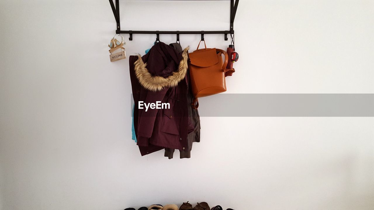 Clothes hanging on wall