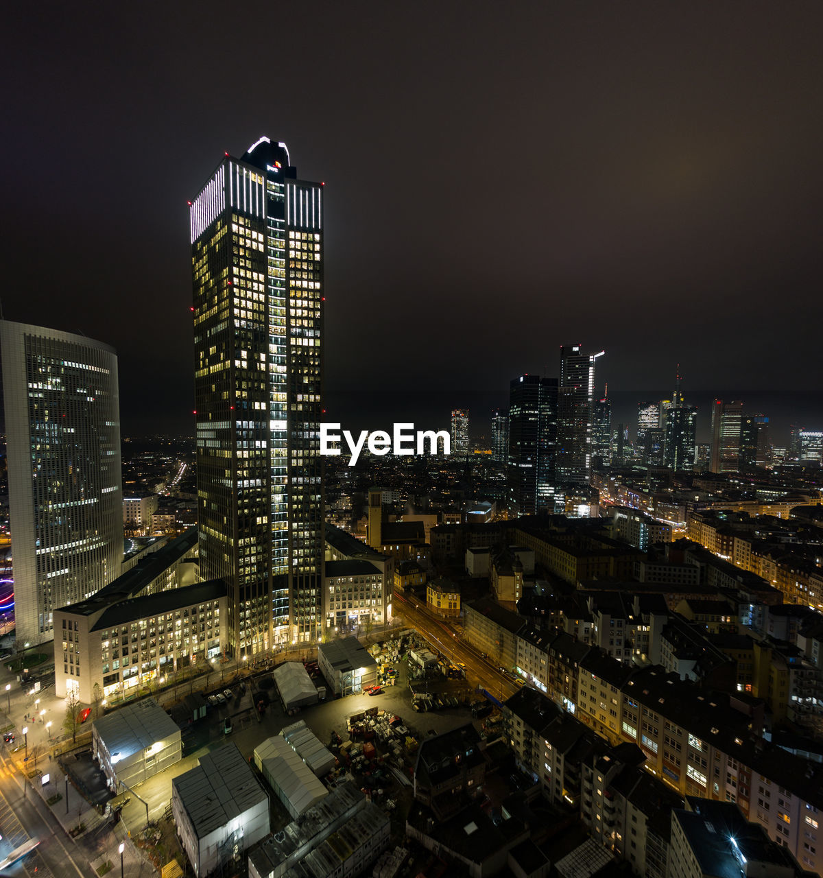 Illuminated buildings in city at night