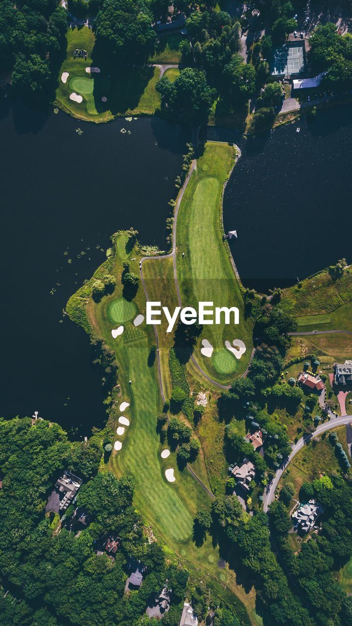 Aerial view of bay amidst field