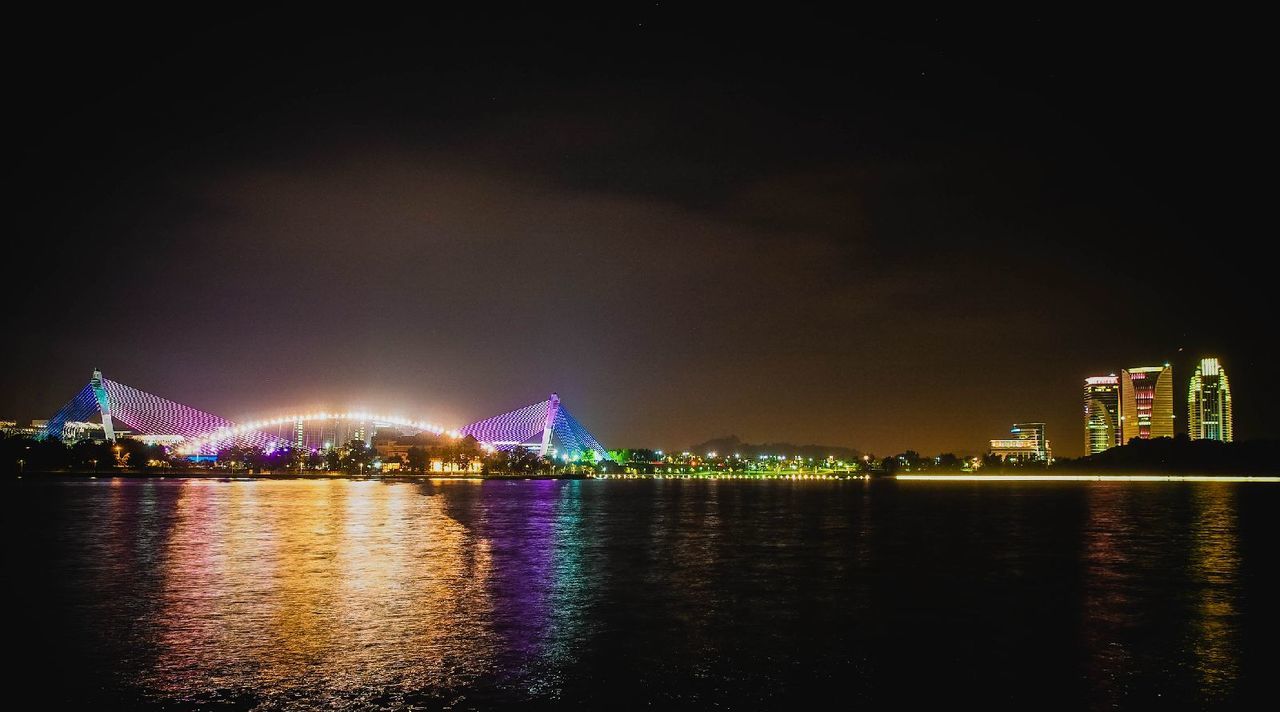 VIEW OF CITY AT NIGHT