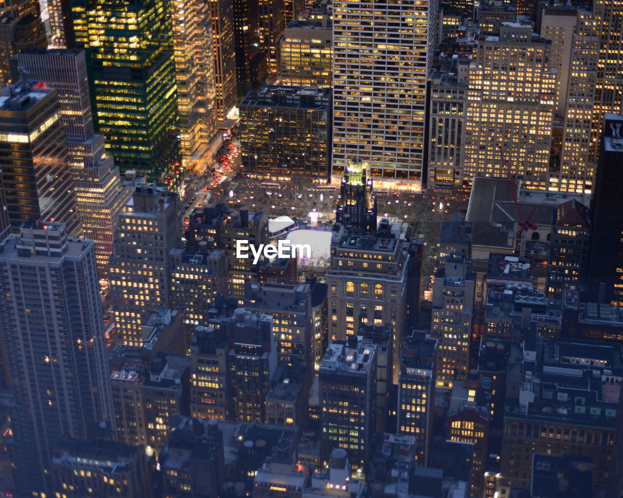 Aerial view of illuminated cityscape at night