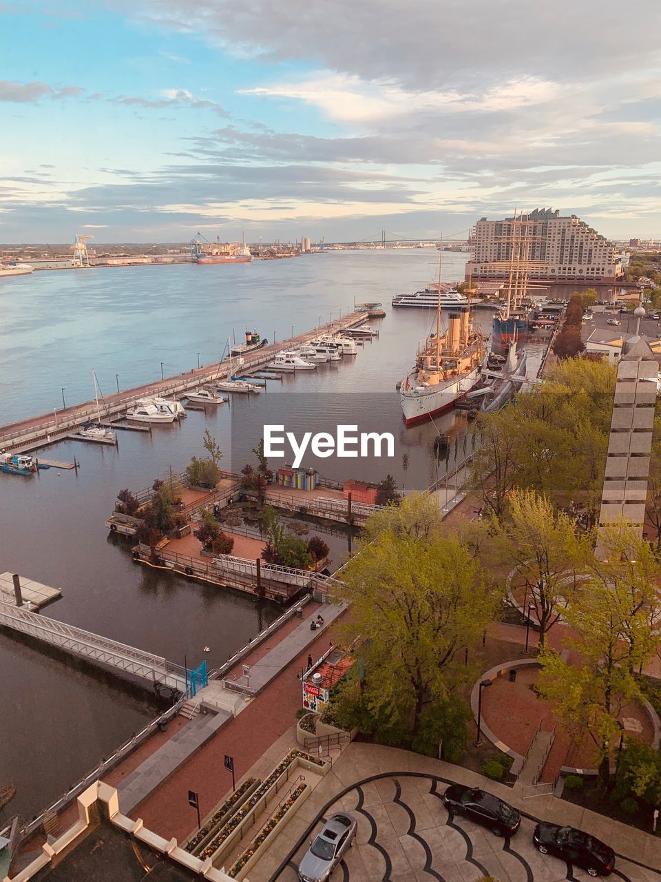 High angle view of buildings by sea against sky
