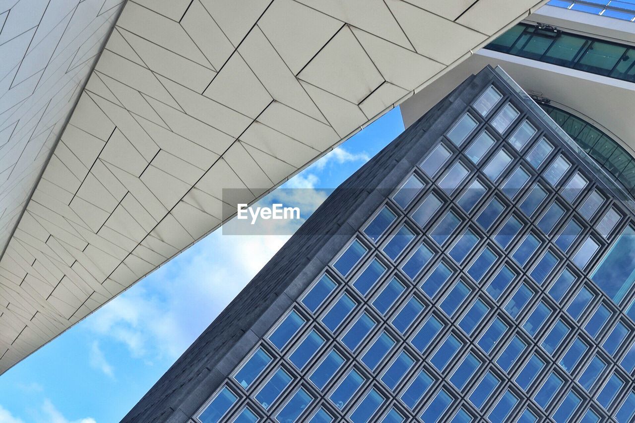 Low angle view of skyscraper against sky