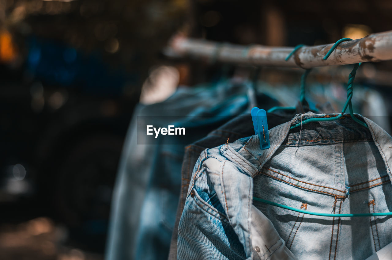 Close-up of clothes hanging outdoors