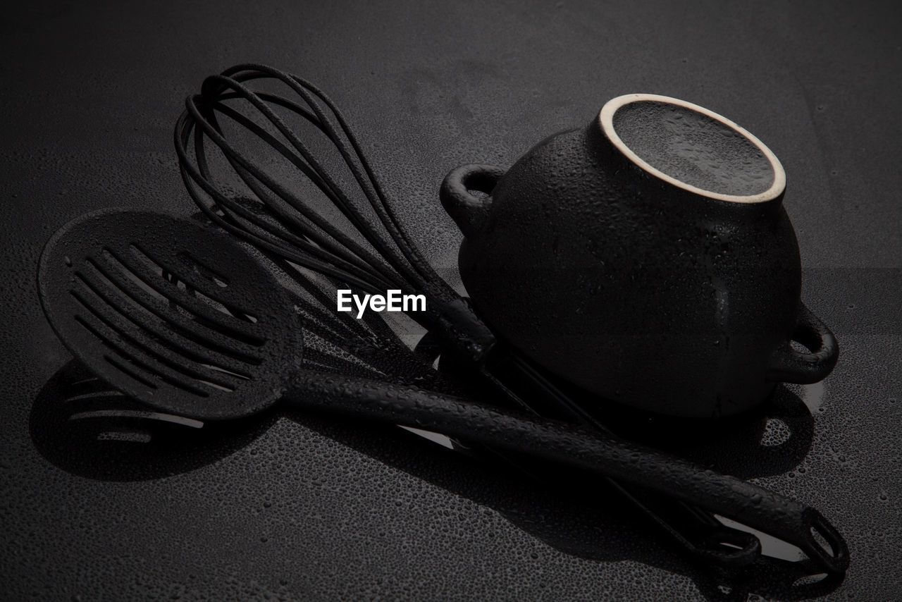 High angle view of old kitchen utensils on table