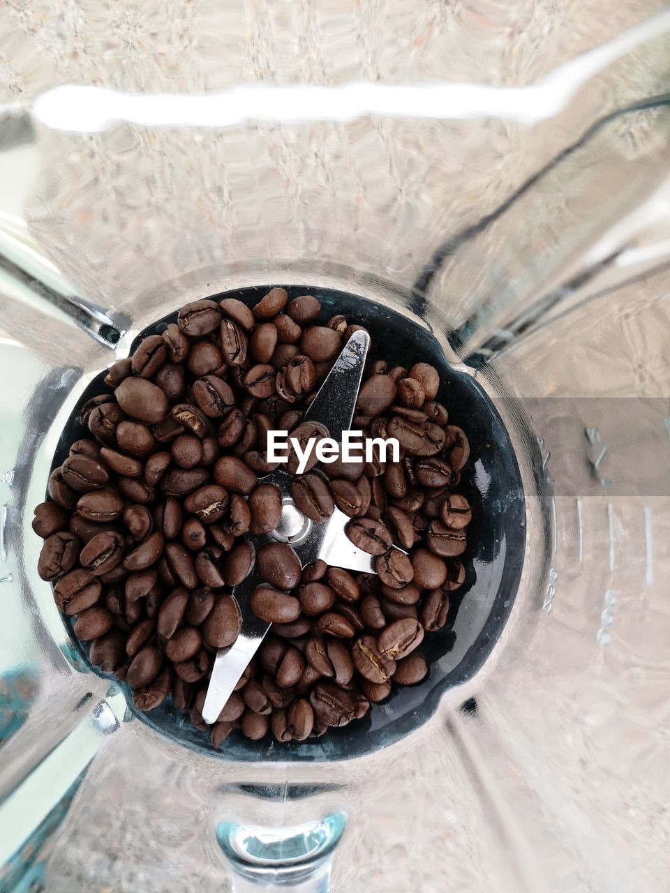 Coffee beans in grinder