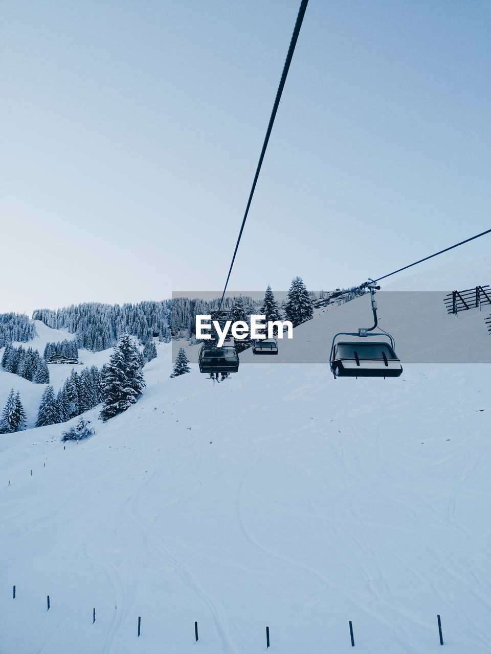 Ski on snow covered landscape ski lift