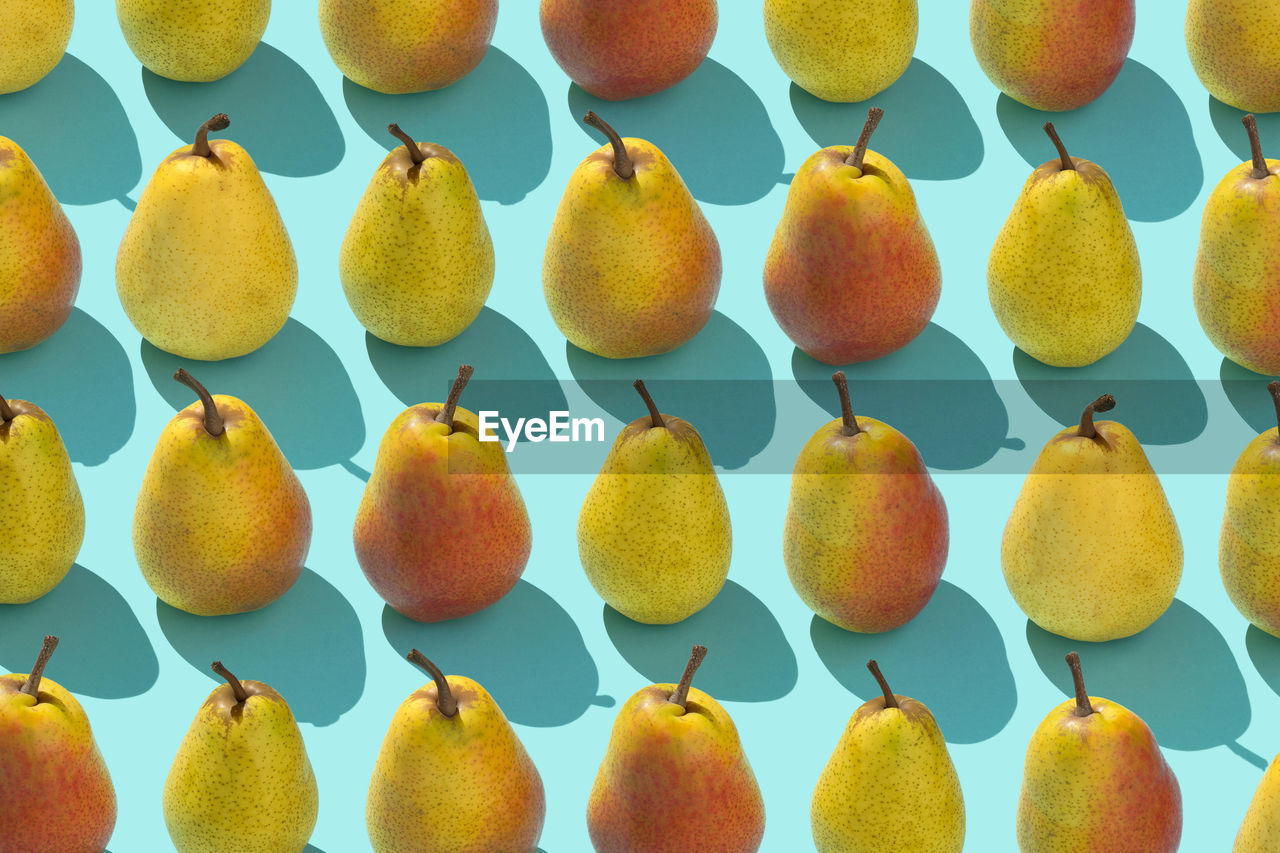 Full frame shot of pears arranged on table