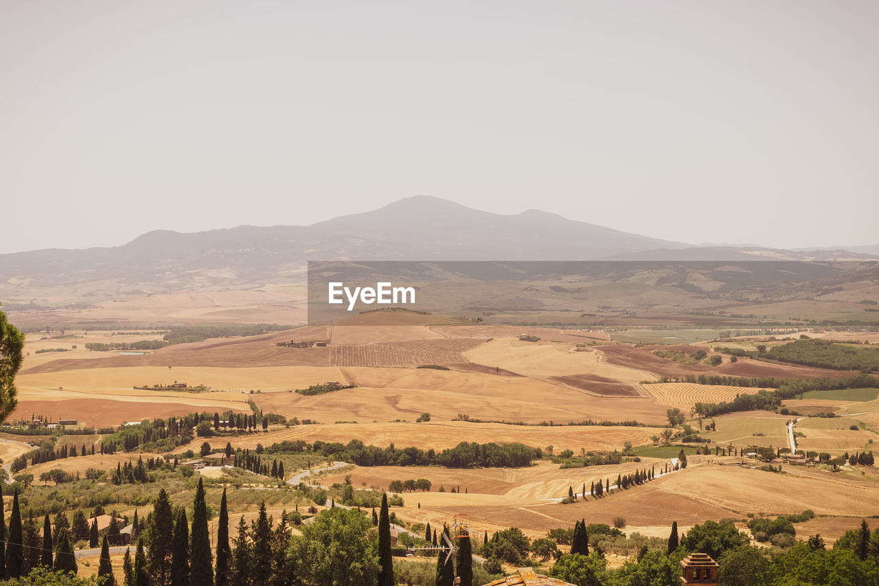 Incredible view of the tuscan countryside during the summer season, from the famous town of pienza.