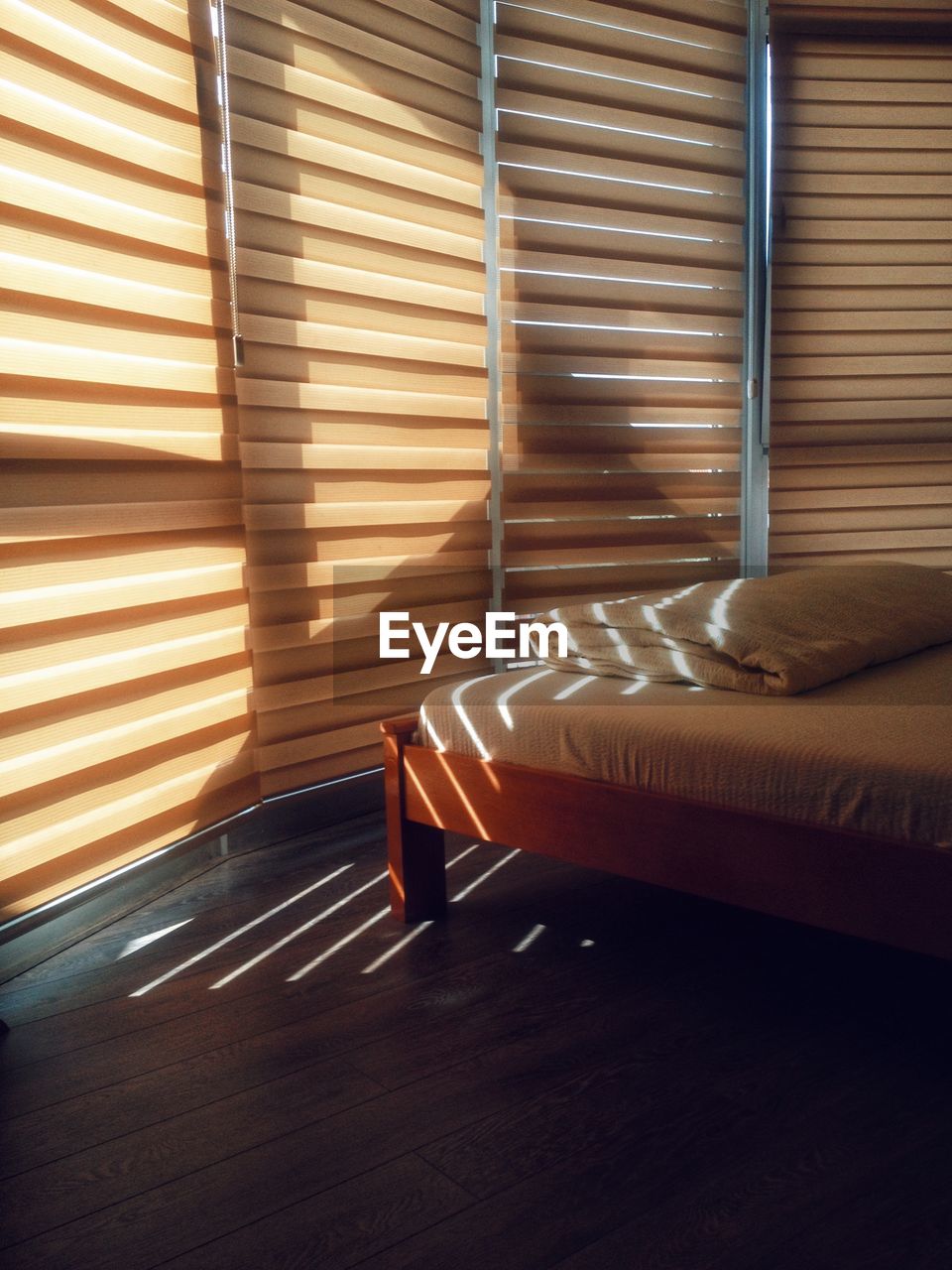 Sunlight falling on bed at home