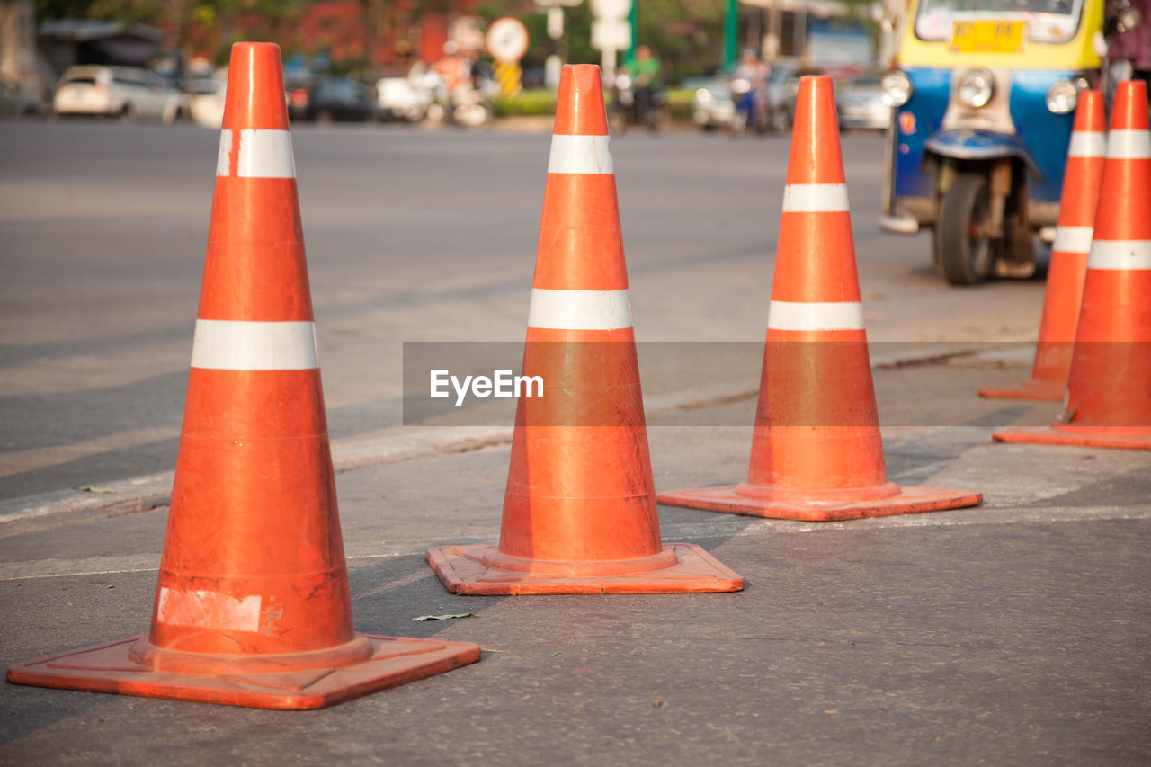 Traffic cones in row on city street