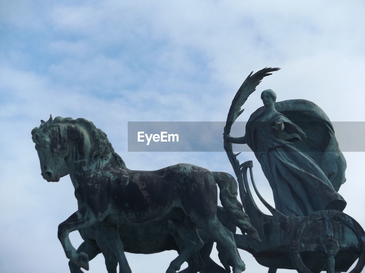 Low angle view of statue against the sky