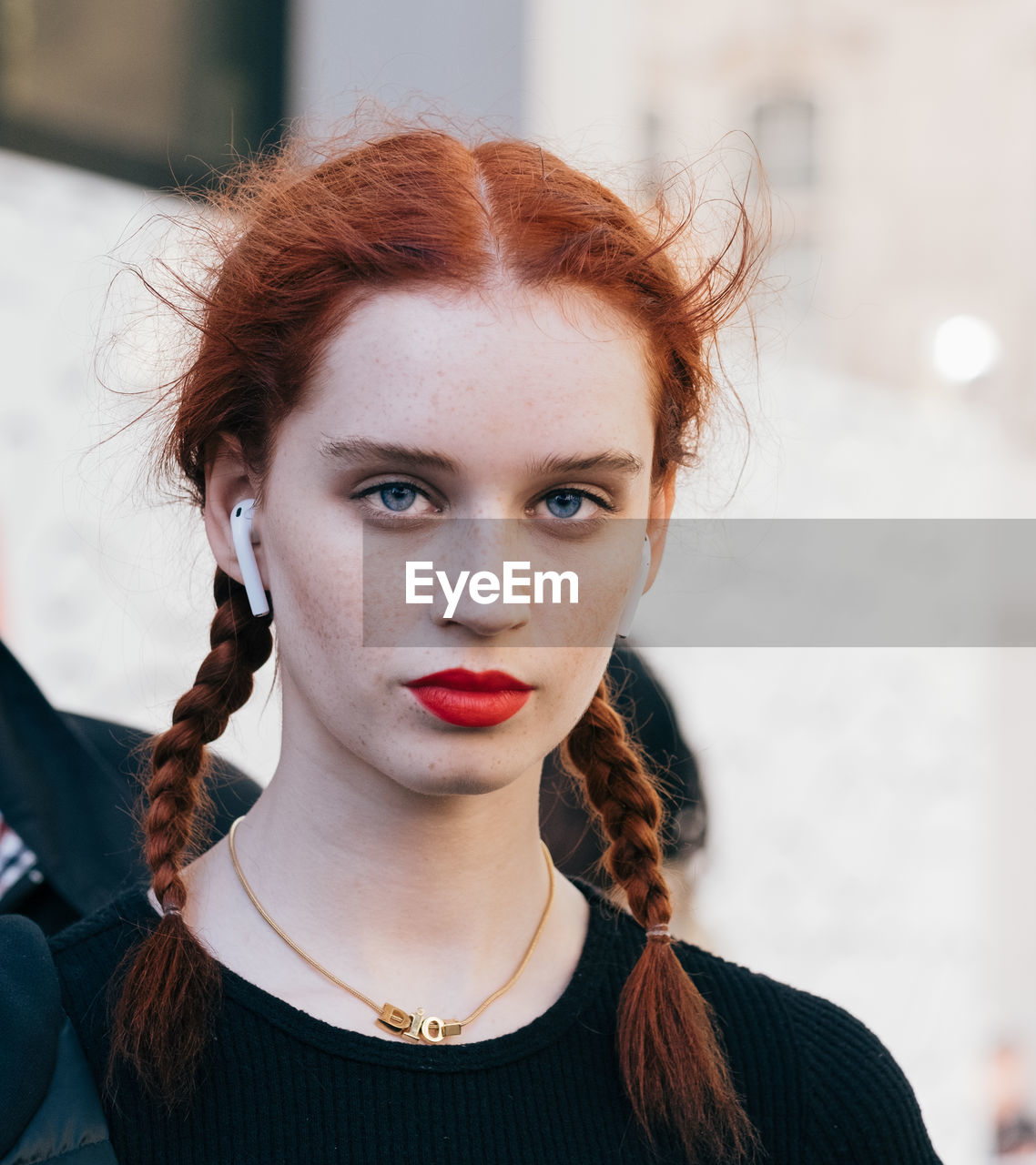 PORTRAIT OF BEAUTIFUL YOUNG WOMAN WITH HAIR