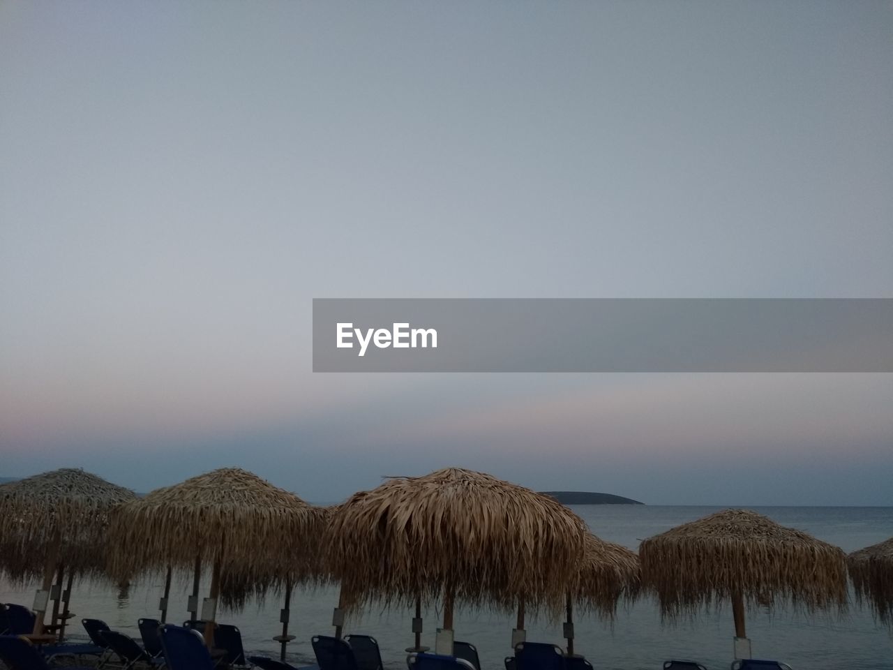 PANORAMIC VIEW OF SEA AGAINST SKY AT SUNSET