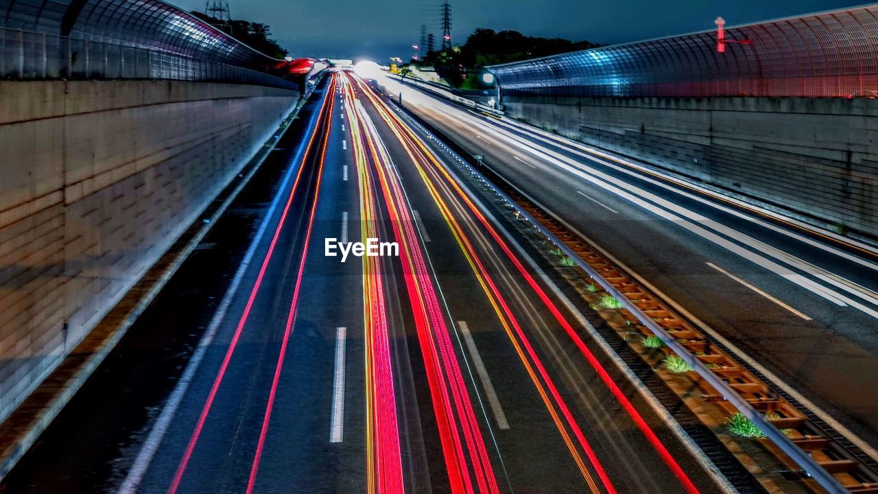 High angle view of light trails on railroad tracks