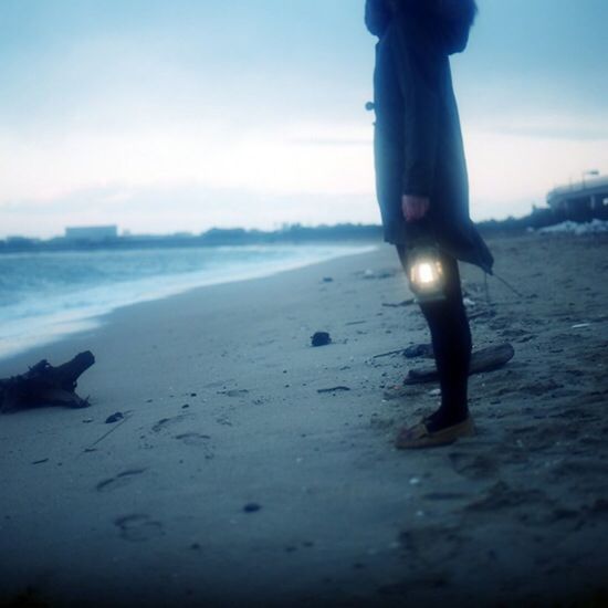 WOMAN JUMPING IN SEA