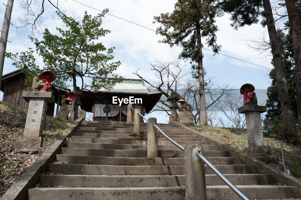 low angle view of man walking on staircase