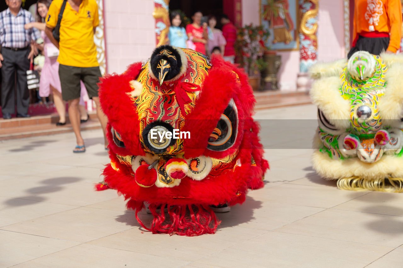 GROUP OF PEOPLE IN TRADITIONAL CLOTHING