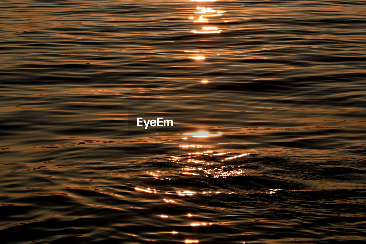 Full frame shot of sea at sunset