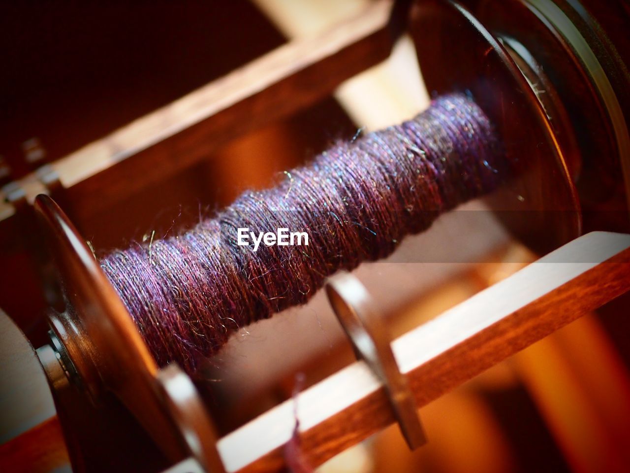 Close-up of bobbin of the spinning wheel
