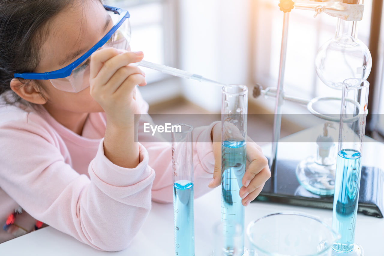 Close-up of girl in science laboratory