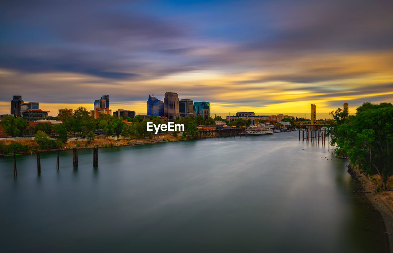 view of bridge over river in city