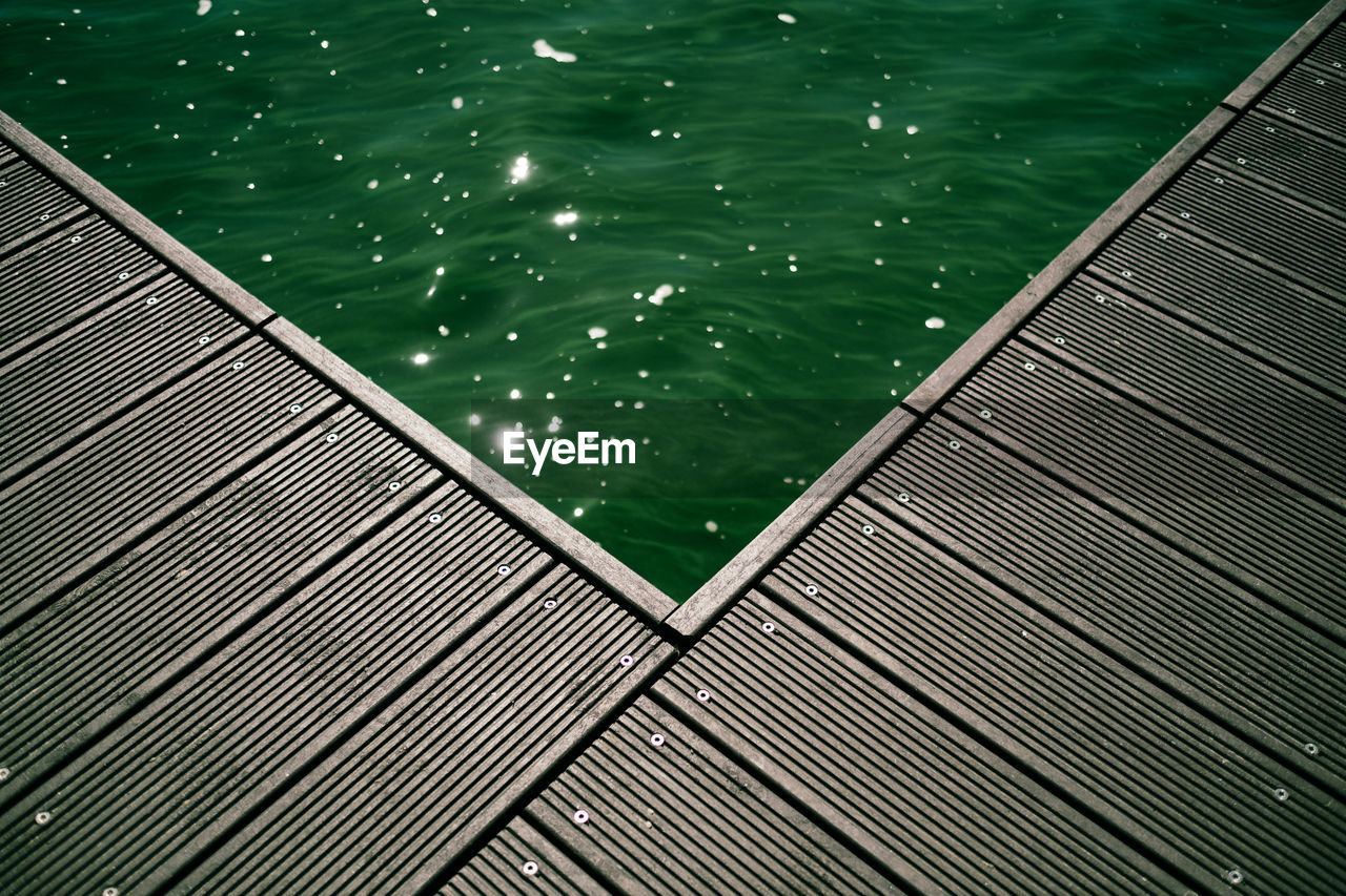 High angle view of swimming pool by sea