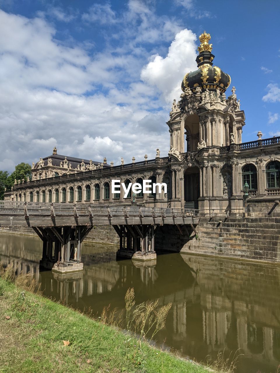 architecture, built structure, travel destinations, landmark, sky, history, the past, travel, building exterior, cloud, tourism, nature, water, palace, city, ancient history, reflection, no people, building, ancient, château, religion, day, historic site, outdoors, bridge, river, plant, belief, place of worship