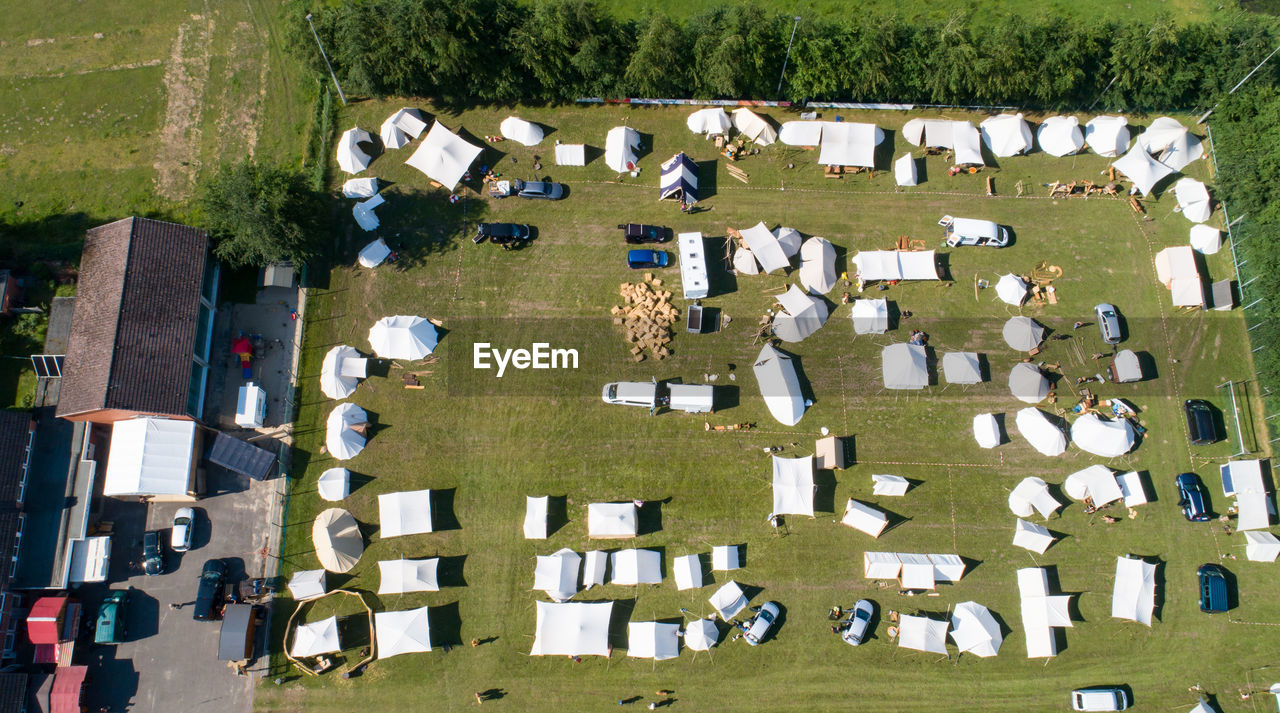 HIGH ANGLE VIEW OF CEMETERY AGAINST SKY