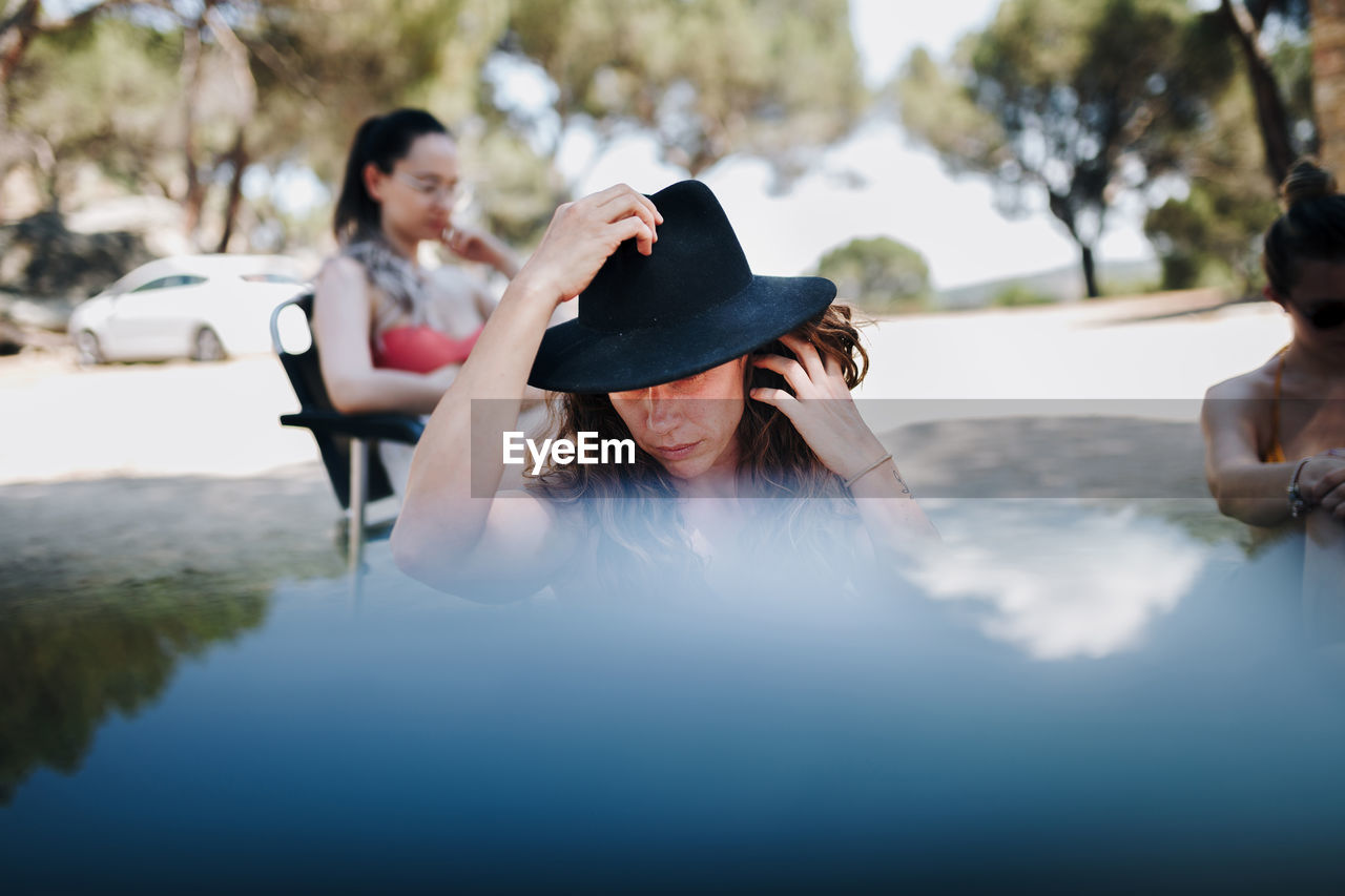 Woman looking away in water