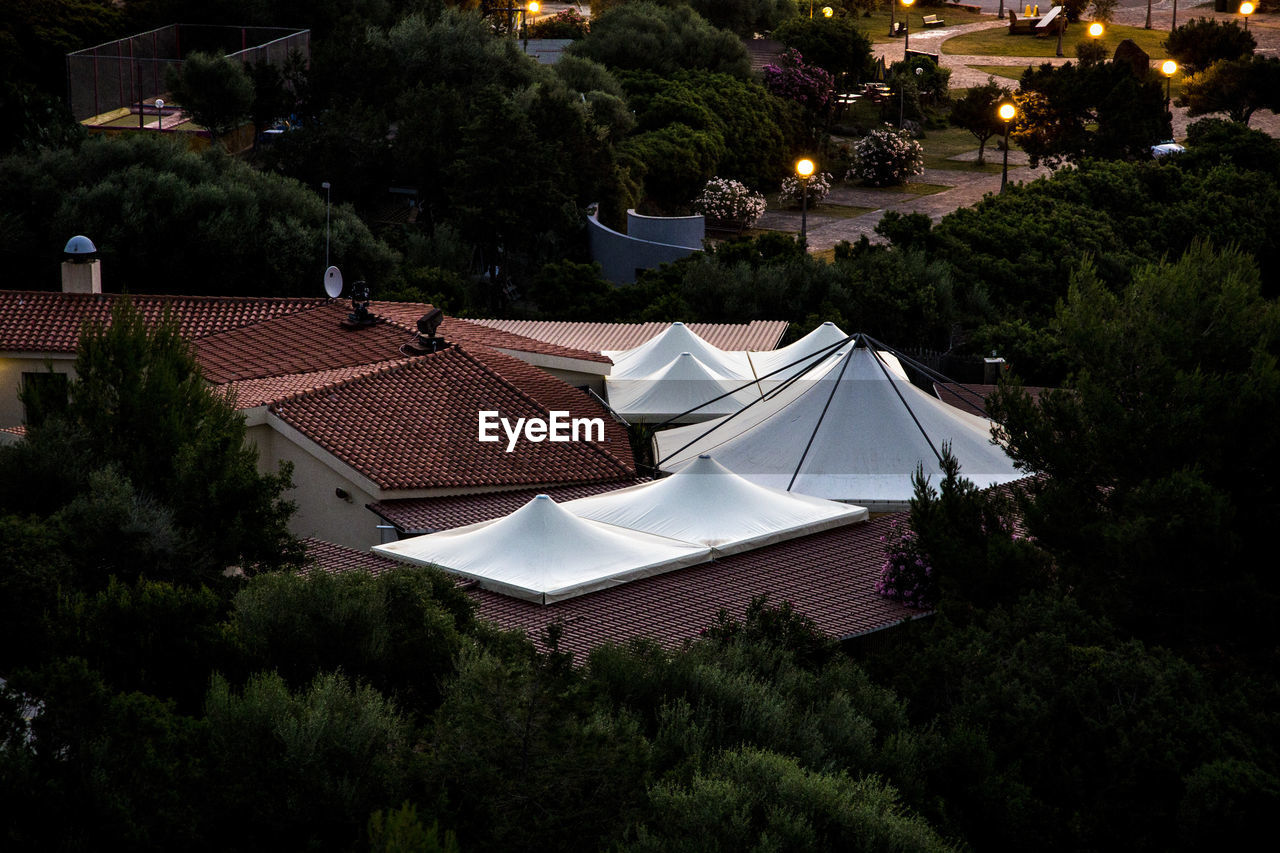 High angle view of tent and buildings against sky