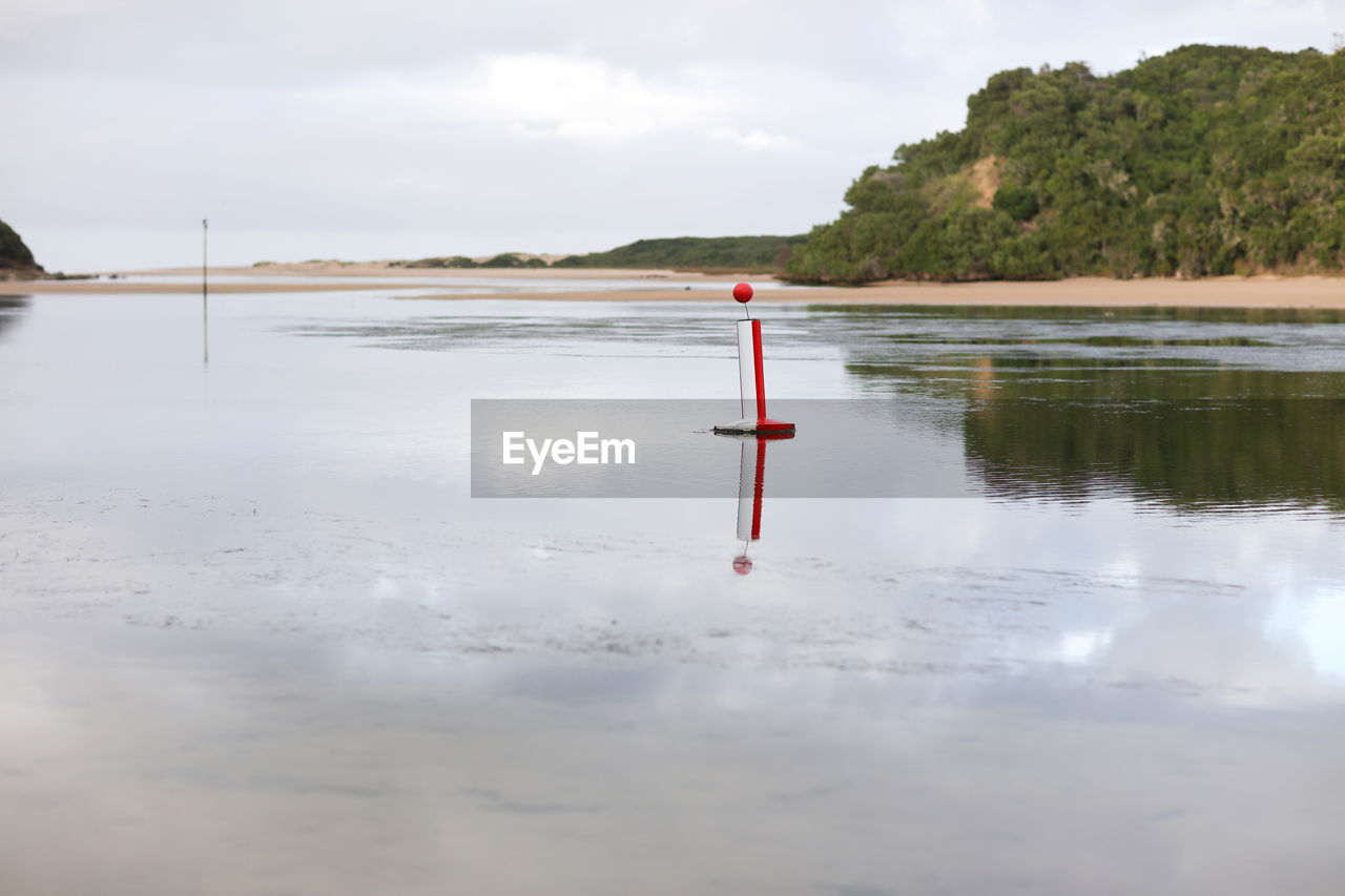 Floating buoy -  anchored in lagoon to warn of danger.