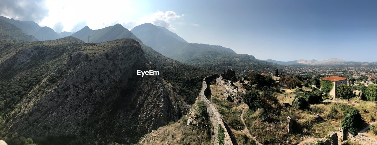 Panoramic view of landscape and mountains against sky