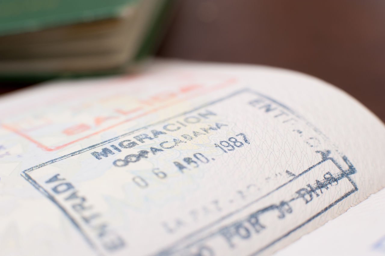 High angle view of passport with stamp