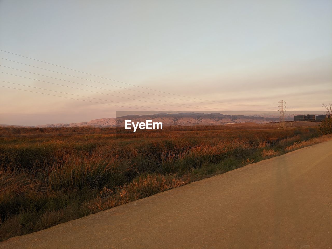 Scenic view of landscape against sky during sunset