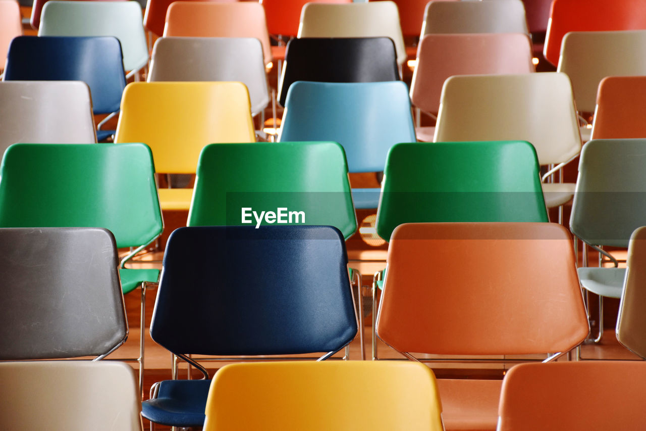 FULL FRAME SHOT OF EMPTY CHAIRS IN ROOM