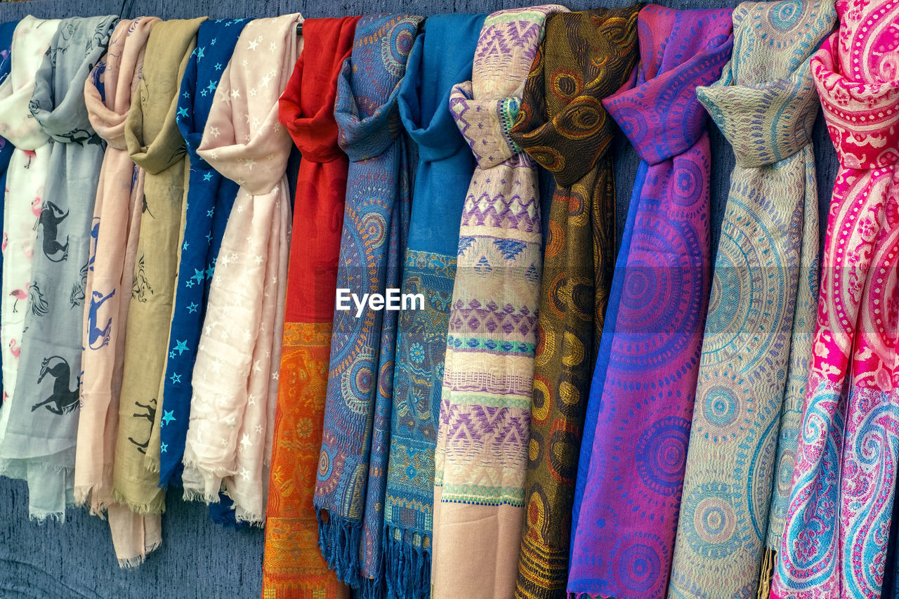 Close-up of multi colored scarfs for sale in market