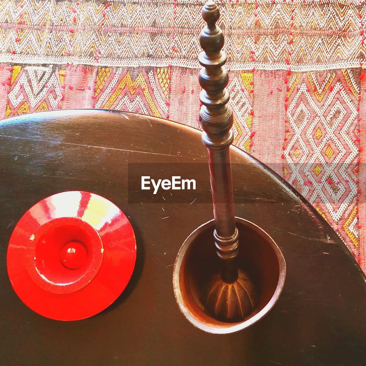 High angle view of old-fashioned wooden wisk on table